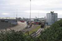 At Aberdeen Waterloo on 4th October, tanks of imported china clay slurry await movement south to Caledonian Paper at Irvine and Iggesund at Workington. The three tramwayed sidings of Aberdeen Harbour Board's yard, on the left, have seen no commercial rail traffic since being constructed more than five years ago.<br><br>[David Spaven 04/10/2017]