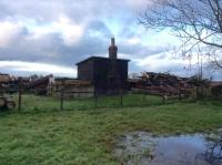 An old platelayers hut still stands on the trackbed immediately to the east of the Pilling station site. It is in good condition and appears to have been <I>adopted</I> by the new landowner. The last goods train left the station in 1963. <br><br>[Knott End Collection 25/11/2017]