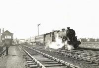 Ayr's Horwich Mugul no 42808 surrounds itself in steam as it restarts a train for St Enoch away from the Prestwick stop in the spring of 1959.<br><br>[G H Robin collection by courtesy of the Mitchell Library, Glasgow 28/03/1959]