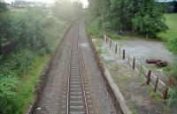 A 1999 view west over the disused twin platforms at Kinaldie station.<br><br>[Ewan Crawford //1999]