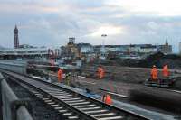 Sparks flying at Blackpool North as a member of the <I>Orange Army</I> trims the reinforcing panels for the new platforms. One month on from closure significant progress is being made in the transformation of this station. 9th December 2017.<br><br>[Mark Bartlett 09/12/2017]