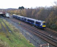 A Glasgow to Inverness service passes the northern throat (if it can be<br>
called that) of Perth station on 3rd December 2017. It is on the Platform 7 line:<br>
the running line in front of it is for​​ Platforms 3 and 4 in the train shed.<br>
<br><br>[David Panton 03/12/2017]