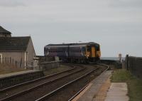 156448 negotiates the the check railed curve on the last stretch of the sea wall north of Whitehaven as it approaches the request stop at Parton. The train is a Barrow to Carlisle service on 13th November 2017.<br><br>[Mark Bartlett 13/11/2017]