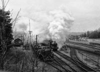 A steamy departure from Andover in March 1986 with one of several shuttle services to Ludgershall during Rail Event 86 operated by ex GWR 4-6-0 no.4930 Hagley Hall.<br><br>[John McIntyre 22/03/1986]