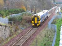 A Tweedbank - Edinburgh sevice runs north through the site of Kilnknowe Junction on 9 November 2017. <br><br>[John Furnevel 09/11/2017]