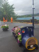 Barrel train, advert for the coffee shop and tree clearance in the disused platform.<br><br>[John Yellowlees 14/08/2017]