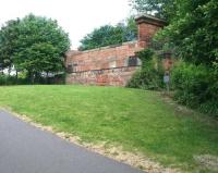 The bridge abutment just south of the planned (but never built) Ferry Road station that once helped to carry the Caledonian Railway's 1903 'Leith New Lines' over the NB North Leith branch (from which the photograph is taken) at the bottom of Edinburgh's Gosford Pace. Just off camera to the left the two stone piers on which the south end of the bridge rested still survive [see image 2196].<br><br>[John Furnevel 07/06/2009]