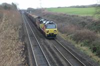 Colas 70817 descends Stormy Bank with the Chirk to Baglan Bay empty timber wagons on 8th December 2017.<br>
<br>
<br><br>[Alastair McLellan 08/12/2017]