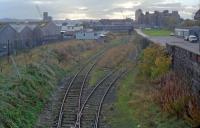 View south towards Waterloo in 1989. The line was closed at the time. The peculiar curvature of the line on the right sidestepped the signal box. But, before that, the line on the right served a two road carriage shed in the foreground. Some years after that was removed, the line was looped to improve facilities at Waterloo.<br><br>[Ewan Crawford 03/11/1989]