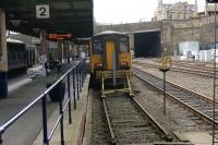 Platform 2 at the west end of Huddersfield station is a short bay platform normally used by the shuttle service to Sheffield via Penistone. The 1213 hrs departure waits for passengers just before midday on 12 March 2013.<br><br>[John McIntyre 12/03/2013]