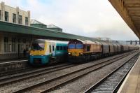DBS 66005, seen passing through Cardiff Central with a Margam Llanwern train, while 175101 waits departure with a Manchester Picadilly to Carmarthen service<br>
<br>
<br><br>[Alastair McLellan 05/12/2017]