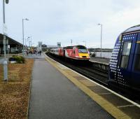 It's 1118 on 7th November 2017 and a northbound VEC HST meets a 170 for Glasgow Queen Street. The southbound service will shortly enter the single-track<br>
section to Usan, just vacated by the 125. This is all handled by Montrose North box these days, with South and Usan flattened a few years ago. Three boxes in two miles *was* a bit of an extravagance in the 21st century.<br>
<br><br>[David Panton 07/11/2017]