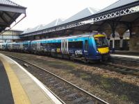 Altogether now: 'See it; say it; sorted'. The BTP liveried 170 407 calls at<br>
Perth with a Glasgow to Aberdeen service on 5 December.<br><br>[David Panton 05/12/2017]