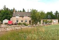 The privately owned former station at Velvet Hall, Northumberland, in the summer of 2005. The station had lost its passenger service in 1955, with the Kelso - Tweedmouth section closing completely 10 years later. The station opened in 1849 to serve the village of Horncliffe, the most northerly village in England, standing three quarters of a mile beyond on the south bank of the River Tweed. View north west from alongside the A698.  <br><br>[John Furnevel 05/07/2005]