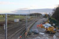 The <I>Orange Army</I> at work on Christmas Day 2017 at Salwick. The small signal box did not survive December but this location will still be the point where signalling is handed over, from Preston PSB to the Manchester Control Centre which will cover the line west of this point. [See image 61728] for the same view a month earlier. <br><br>[Mark Bartlett 25/12/2017]