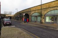 This view of the southern portal of the High Level Bridge on 9 December 2017 shows the site of Gateshead West station to the left and Gateshead East Station above the arches and which were joined by a footbridge.  The former was closed in 1965 whilst the latter, in an almost derelict state, closed in November 1981, a week after the opening of Gateshead station on the Metro system.<br><br>[Malcolm Chattwood 09/12/2017]