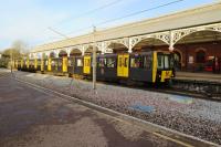 A Metro 4-car unit arrives at Monkseaton on 9 December 2017, heading back towards Newcastle to terminate at St James.  Like the other coastal stations on the North Tyneside loop, Monkseaton has benefitted in recent years from an initiative to attract local businesses to use the vacant buildings to help maintain an attractive environment.<br><br>[Malcolm Chattwood 09/12/2017]