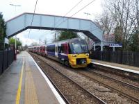 An Ilkley to Leeds service calls at the first station, Ben Rhydding, on 19th December 2017. This unstaffed station, serving a suburb of Ilkley, is only a mile from the branch terminus.<br><br>[Mark Bartlett 19/12/2017]