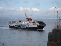 CalMac Ferry MV Loch Riddon approaches Lochranza slipway on Arran to form the 12.00 return crossing to Claonaig terminal on Kintyre on 17 June 2013<br><br>[David Pesterfield 17/06/2013]