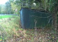 The passenger shelter at Fallgate is a remarkable survivor, some 70 years after closure. The narrow gauge track passed to the left of the shelter.<br><br>[Ken Strachan 25/10/2017]