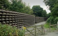 Stacks of track panels alongside the A93 at Banchory in 2000, for use on the Royal Deeside Railway. (Looks like a Christmas present, only lacking a ribbon!). <br>
<br><br>[Bill Roberton //2000]
