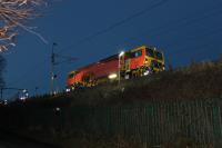 <I>Finishing touches.</I> After a four-day Christmas line closure to refurbish the WCML viaduct over the River Wyre at Scorton [See image 62247], Colas DR73921 was tamping the relaid Down Line on the evening on 27th December, prior to re-opening to normal traffic the following morning.  <br><br>[Mark Bartlett 27/12/2017]