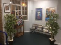The recently refurbished waiting room and ticket office at Whitecraigs in December 2017. The plants are artificial but help to give a bit a colour!<br>
<br>
<br><br>[Peter Mckinlay 20/12/2017]