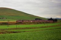 A Class 86 heads north with a service to Glasgow near to Abington in August 1994.<br><br>[John McIntyre 06/08/1994]