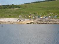 A view of Claonaig slipway, on the Kintyre peninsula, taken from the Calmac Ferry <I>MV Loch Riddon</I> as it nears the end of its journey across the Kibrannan Sound from Lochranza on the Isle of Arran. 17th June 2013.<br><br>[David Pesterfield 17/06/2013]