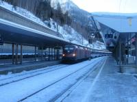 Double headed EC163 from Zurich to Graz pulls into St Anton am Arlberg on 23rd December 2017. The first two coaches are Swiss 1st Class Gotthard Express Panorama coaches.<br>
<br>
<br><br>[Alastair McLellan 23/12/2017]