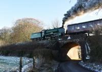 <I>Schools</I> 4-4-0 No.925 'Cheltenham' on 28th December 2017, just having departed Medstead for Ropley. For those interested in seeing and hearing a steam engine at work it is advisable to find a good spot on the steep section from Ropley to Medstead. It can be worth getting out of bed for!<br>
<br><br>[Peter Todd 28/12/2017]