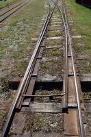 A 2-part switch on the 891mm gauge track in the Hesselby station yard. Like most points only part of the S&C actually moves.The switch rails are supported by longitudinal steel plates nailed onto the wooden bearers only as far as the sixth bearer from the toe end nearest the camera. As in standard gauge S&C units the crossing part is fixed and is separate from the switch.<br><br>[Charlie Niven 05/07/2017]