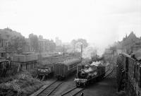 GNoSR 4-4-0 No.49 <I>Gordon Highlander</I> running round at Waterloo before departing with SLS-RCTS special train [See image 40583].<br><br>[David Murray-Smith 13/06/1960]