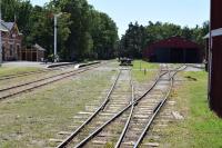 View of the station yard Hesselby, Isle of Gotland. The engine shed is on the right background. Immediately on the right is the railway museum, a former warehouse.<br>
In the foreground is the fixed nose of a switch complete with guide plates.<br>
 For more information [see image 62440].<br><br>[Charlie Niven 05/07/2017]