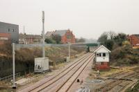 At the end of 2017 four of the five surviving mechanical signal boxes on the Fylde lines had been demolished, leaving only Poulton No.3. Here it is seen on 9th January 2018 next to the simplified track layout. Catenary masts are appearing on all sides, and lying in the foreground waiting to be erected when it is finally demolished. [See image 44186] taken from the same spot in 2013.  <br><br>[Mark Bartlett 09/01/2018]