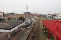 The view northwards from Blackpool Pleasure Beach station on 9th January 2018, during the electrification closure of the Blackpool lines. A new colour light (protecting the buffers at Blackpool South) has appeared at the lineside, and presumably the old <I>fixed distant</I> board it replaces will be removed in due course. It appears a number of signals are being installed on this line (that has been one train only working for many years). This may now allow some flexible turn back working, which would assist events such as the Open Golf Championships at Ansdell & Fairhaven. <br><br>[Mark Bartlett 09/01/2018]