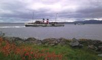 On 24th August 2010 PS Waverley draws astern from the pier at Tarbert to undertake a short cruise on Loch Fyne as MV Isle of Cumbrae heads for the ferry slip on a service from Portavadie. <br><br>[Malcolm Chattwood 24/08/2010]
