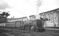 The combined early afternoon Glasgow/Edinburgh - Manchester service about to leave Carlisle on 5 August 1967 behind Britannia Pacific no 70014 <I>Iron Duke</I>.<br><br>[K A Gray 05/08/1967]