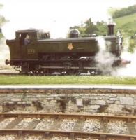 Pannier tank 0-6-0 1638 leaving the shed at Buckfastleigh in 1981.<br><br>[Gordon Steel 18/07/1981]