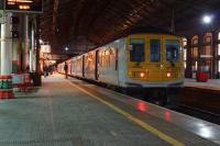 The 1930 hrs Preston to Liverpool Lime Street waits to depart from platform 2 at Preston on 13 January 2018. Although the tail lights are lit, this will be the front of the train, once the driver arrives and opens up the cab.<br><br>[John McIntyre 13/01/2018]