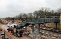 With one week to go the footbridge is now installed at Kirkham and the new third platform is being surfaced. [See image 62548] taken less than a week earlier. No doubt the new lifts will be a later addition to the facilities. As from Monday 29th January there will be an hourly service between Preston and Blackpool South calling here with full resumption of services in time for Easter 2018. <br><br>[Mark Bartlett 22/01/2018]