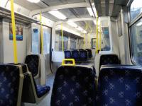 A look inside a Class 314, due to be scrapped this year in the Class 385 cascade. They look not too bad for their years, though they do lack toilets, automatic announcments (a blessing?), disabled space, visual displays and even door buttons. The lack of buttons is a particular issue at termini in the winter, when the open doors ensure that the inside temperature equalizes with the outside.<br>
<br><br>[David Panton 18/01/2018]