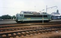 A SNCF 25500 BB electric locomotive runs light through Thouars station in August 1994. By this date this pale green SNCF livery was becoming obsolete, replaced by a more striking white and orange scheme. This was one of a class of 194 locos but was the first of an upgraded sub class with improved cabs and a single large body side grill replacing a multitude of smaller ones (a bit like the BR Class 25?).<br><br>[Mark Bartlett 05/08/1994]