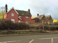 The station at Ford Bridge, to the south of Leominster, operated from 1866 to 1954. The level crossing closed after the Leominster bypass (in the foreground) opened in 1988. I once paced a cement train here while driving down the bypass - the combination of a misty night and a white dust covered train made for a spooky experience. [Ref query 23 January 2018]<br><br>[Ken Strachan 15/01/2018]