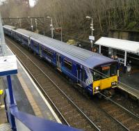 These days Alexandra Parade is days mainly served by Cumbernauld to<br>
Dumbarton Central services and one of these pulls in on Saturday 13th<br>
January 2018. The driver is no doubt steeling himself for the gruelling 600<br>
metre haul to Duke Street.<br>
<br>
<br><br>[David Panton 20/01/2018]