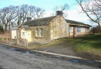 The former station at Rosslynlee on the Peebles Loop, looking west over the site of the level crossing in March 2005. Originally opened as Roslin in 1855, the name was changed to Rosslyn 9 years later, before becoming Rosslynlee in 1872. The station closed along with the line in 1962 and has since become a private residence [see image 48289].  <br>
<br><br>[John Furnevel 30/03/2005]