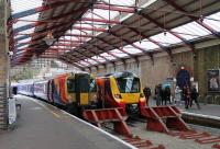 Contrasting front ends at Windsor and Eton Riverside on 27th January 2018, with 458522 and 707013 at the buffers. These two classes of five-car EMUs appear to be working turn and turn about on these London South Western services.  <br><br>[Mark Bartlett 27/01/2018]