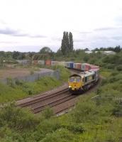 Train 499K from Lawley Street to Felixstowe heads for the flyover at Nuneaton.<br><br>[Ken Strachan 12/06/2017]