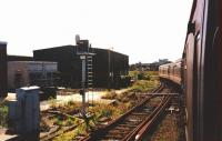 Having reversed into Folkestone East Train Roads a boat train proceeds across Folkestone Junction down, in both senses, towards Folkestone Harbour Station in September 1992. For some reason it took the Up line and crosses to the Down line avoiding signal YE79 and the trap points. [Ref query 2 February 2018]<br><br>[Charlie Niven 07/09/1992]