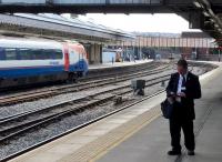 This railman is contentedly checking messages on his 'phone, ignoring the Sprinter in the sidings and the up Javelin. He was considerably less composed when confronted with an app [see image 52974] of youths in the booking area giving a spirited rendition of the 'Time Warp'. Such is life on today's railway.<br><br>[Ken Strachan 16/08/2017]